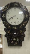 A Victorian black lacquered mother of pearl inlaid and gilt decorated cased drop dial wall clock,