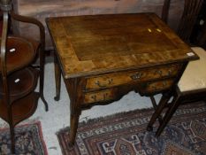 An oak and walnut cross banded lowboy in the 18th Century manner,