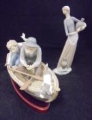 A Lladro figure of a Fisherman with boy and dog in a rowing boat "Paloma" impressed "5215" to the