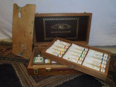 A Windsor & Newton artists' box, the contents of paints, brushes,