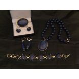 A collection of various Lapis Lazuli mounted jewellery including brooch, cufflinks, bracelet,