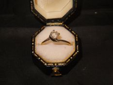 An 18 carat gold and solitaire diamond engagement ring, the stone approx 0.