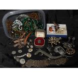 Two tubs of various costume jewellery