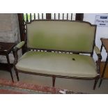 A Louis XVI style two seater sofa with green upholstery