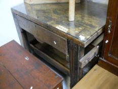 A Vintage Pine workbench with the plank top above a single drawer to square legs united by an