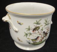 A Herend jardiniere featuring birds in trees surrounded by butterflies,