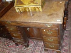 A George III mahogany knee hole desk,