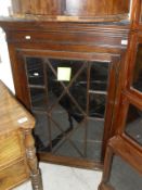 A 19th Century oak hanging corner cabinet,