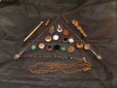 A box containing various costume jewellery including cameo brooch, malachite buttons,