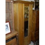 A late Victorian ash single mirror door wardrobe and five various prints