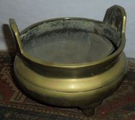 A 19th Century Chinese brass censer with 16-character mark to base on three cylindrical legs