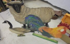 Three hand painted 'dummyboard' animal figures, one as a sheep,