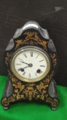 A 19th Century ebonised and marquetry inlaid cased French mantle clock,