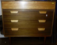 A Uniflex bedroom suite comprising dressing table, chest of drawers,