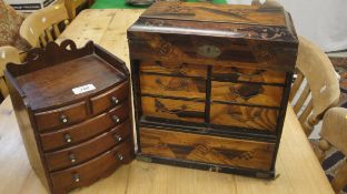A Victorian mahogany miniature bow fronted dressing chest of two short over three long drawers,