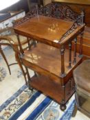 A Victorian rosewood whatnot,