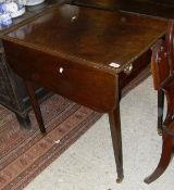 An early 19th Century mahogany drop-leaf Pembroke table,