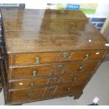 A 19th Century and later Oak chest of four long graduated drawers with brass handles,