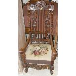 A pair of William and Mary style walnut framed hall chairs in the late 17th Century manner