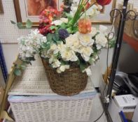 A cream painted wicker basket,