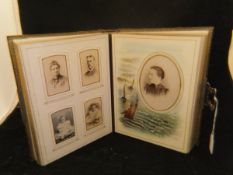 A Victorian photograph album bearing label "John J Banks Stationer Imperial Library Cheltenham",