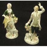 A pair of early 20th Century Sitzendorf figures of a gallant and his lady with tambourine and lamb