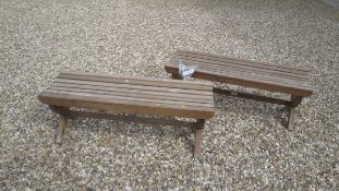 A pair of Rusco teak garden benches