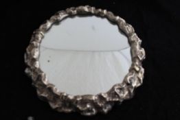 A circa 1900 plated framed cake stand with mirrored centre as a rockpool,