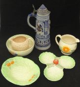A Clarice Cliff "Crocus" pattern fruit bowl, an Arthur Wood jug, Kirkland's Embassy ware jug,