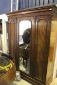 A Victorian mahogany wardrobe compactum,