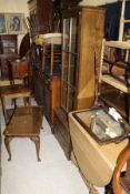 A collection of furniture comprising a Victorian walnut sideboard, four various chairs,