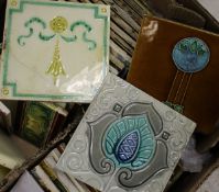 A collection of 33 Art Nouveau tube-lined pottery tiles including Minton, Stubbs and Hodgart,