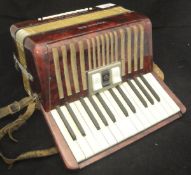 A Hohner Student IVM accordion CONDITION REPORTS Doesn't have a carrying case,