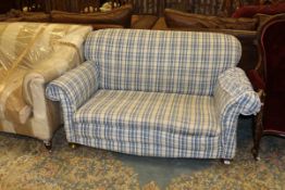 A 20th Century two seat sofa ina blue and white check upholstery
