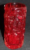 A Whitefriars Geoffrey Baxter designed cylindrical vase with a ruby ground