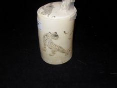 A 19th Century Japanese Meiji Period carved ivory pot and cover,