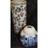 An early 20th Century Chinese polychrome decorated cylindrical vase with various floral sprays and