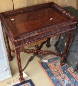 A modern mahogany occasional table with galleried top,
