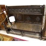 An oak settle in the 17th Century manner,