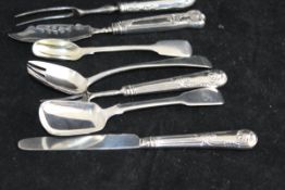 A collection of silver forks,