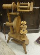 A Peacock spinning wheel made of rimu wood