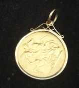 An 1885 gold sovereign with 9 carat gold loose pendant mount, 9.