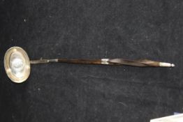 An 18th Century silver punch ladle,