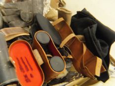 A box containing eight pairs of binoculars, various leather driving gloves, British Rail coat,