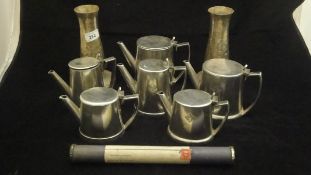 Two Dutch plated three piece tea sets by V Zwanenburg for the Holland Amerika Lijn bearing "N A S