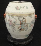 A Chinese polychrome decorated barrel shaped jar and cover,