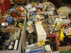 Fourteen boxes of various toy cars to include Dinky Toys Bedford tipper truck,