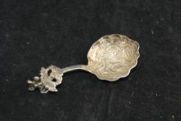 An 18th Century Continental white metal caddy spoon,