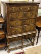 A walnut chest onstand in the early 18th Century manner,