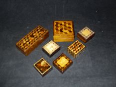 Three 19th Century Tunbridge ware parquetry decorated boxes and four Tunbridge ware stamp boxes,